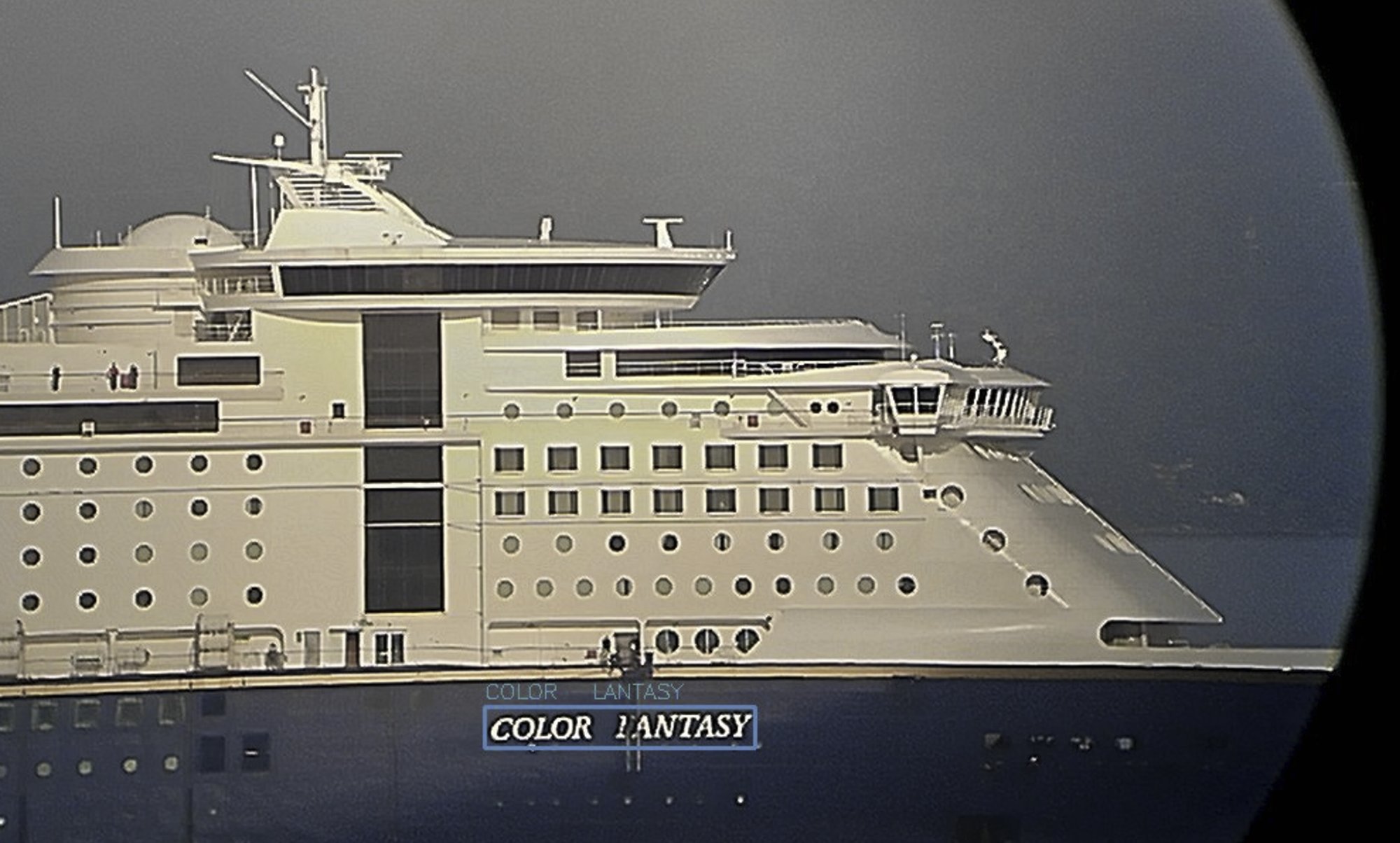 OCR reading the name Color Fantasy off the ship's hull, partially obscured by a maintenance lift